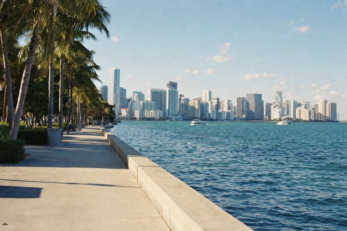 The waterfront promenade at Bayfront Park in downtown Miami looking out across Biscayne Bay toward the skyline